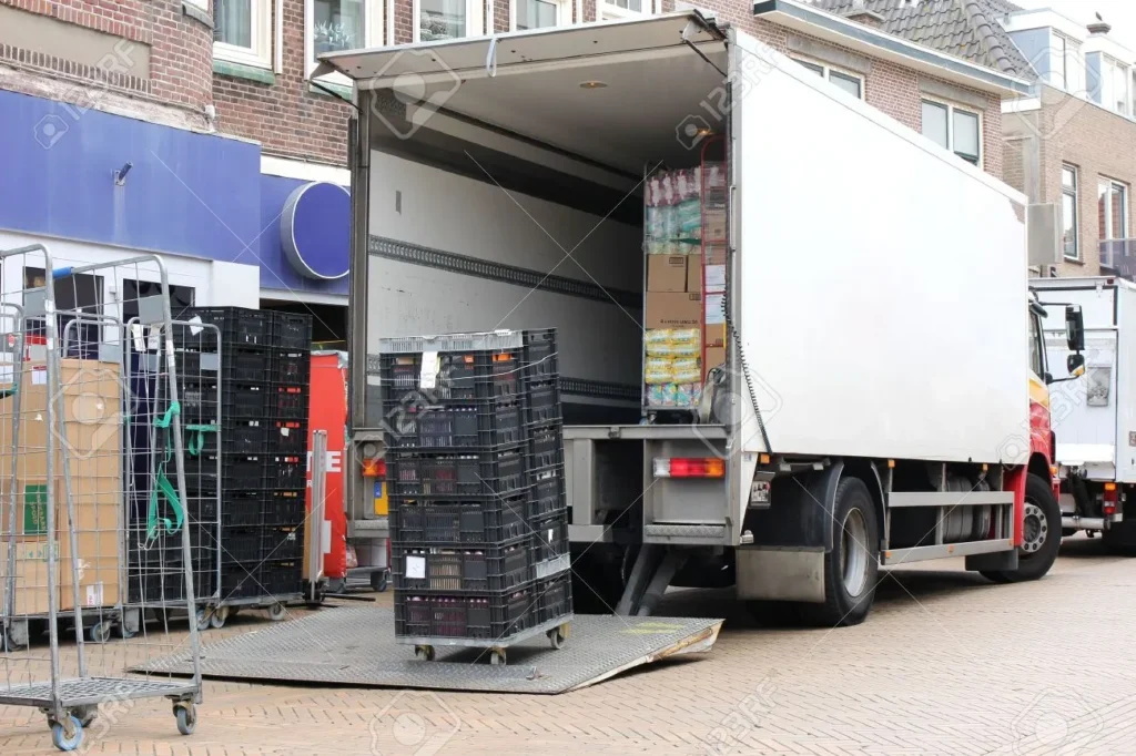 Hariom Packers and Movers truck unloading household goods during home shifting service