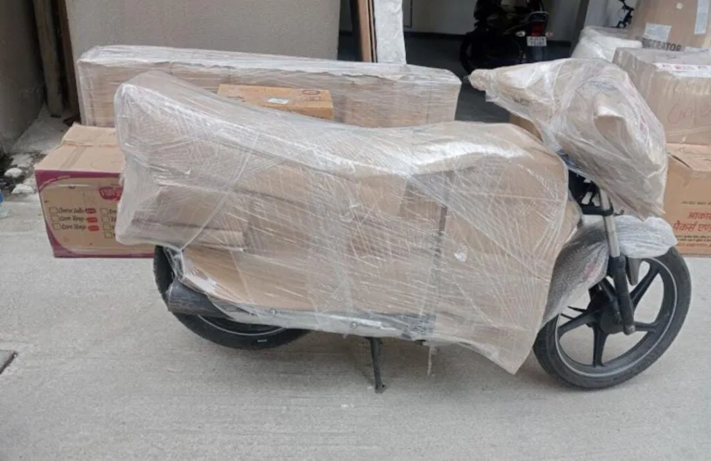 Professional two wheeler shifting service by Hariom Packers and Movers in Varanasi